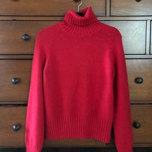 Red turtleneck sweater